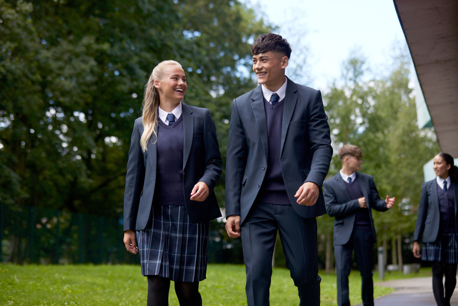 Students wearing school uniform walking